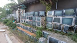 Unique house in Vietnam has fence made from 400 old TV sets