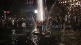 4 girls celebrate election of Joe Biden in Washington Square Park foundation