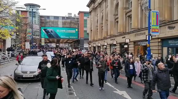 Hundreds of anti-lockdown protesters march through Manchester