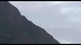 Hong Kong Government Flying Service helicopter puts out fire on flanks of Kowloon Peak