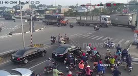 Driver dies and two others injured after truck smashes into cars waiting at traffic lights