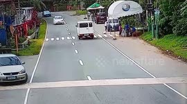 Car doing u-turn crashes into motorcycle rider and passenger