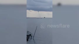 Waterspout Sweeps Across Ocean In The Philippines