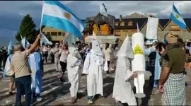 'Anti-vaxxers' wear Ku Klux Klan robes at anti-government march in Argentina