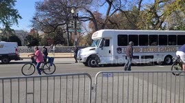 Capitol police unloading officers from a bus at Stop The Steal and F*ck Maga march