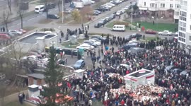 Hundreds of military and police officers surround and detain a group of peaceful protesters who defended the memorial for an opposition activist beaten to death by police in Minsk, Belarus