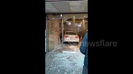 Road rage incident over parking spot results in car crashing into bakery in New York City