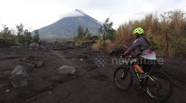 Biking on the foot of mayon volcano after Typhoon Goni hit Albay province
