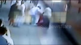 Security personally rescued women who fell from running train in western India