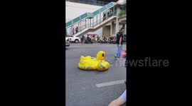 Thailand: ‘War-Torn’ Inflatable Duck Makes An Appearance Ahead Of Protest At Ratchaprasong Intersection In Bangkok 2