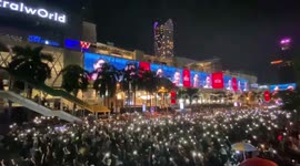 Protesters throw paint and glass bottles at Bangkok police headquarters
