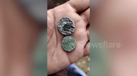 Silver coins from Mughal era unearthed from fields in central India