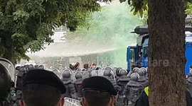 Thailand police fire water cannons and tear gas at anti-government protesters in Bangkok