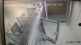 Man ploughs ATM with hoe in China