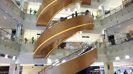 Spiral-shaped escalators in Shanghai shopping mall
