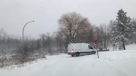 Good samarithan pulling out stranger in snowstorm