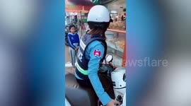 This could be the beautiful Cambodian police woman John Cleese wants to identify as