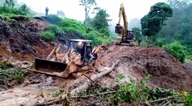 Construction Trucks Leave Unfinished Roads Following Hurricane Iota In Honduras