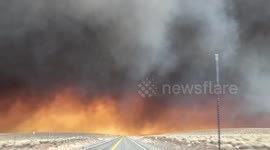 Driving into Armageddon. Smoke from the Valley View fire which started in Walker, CA. billows across the highway.