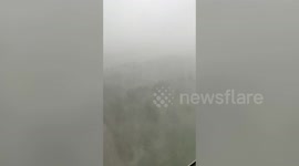 Blanket of fog engulfs coastal town with incessant rainfall in southern India ahead of Cyclone Nivar