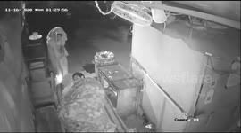 Chilling scene as sleeping security guard has bed set on fire