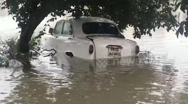 Emergency services personnel extend relief services to inundated localities amid flash floods in southern India