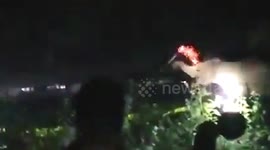 Furious mob attack hungry elephants with fire torches after they damaged their crops in India