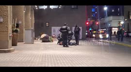 Arrest at the Hyatt Regency Hotel in downtown Calgary, Alberta, Canada