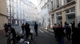 Police fire tear gas at protesters in Paris, France