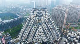 Live like an Egyptian: Pyramid-style highrise buildings tower over Chinese city