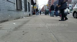 People wait in long lines for hours to get tested for Covid in Brooklyn, New York