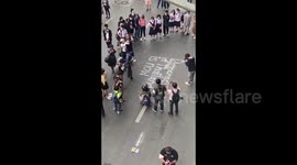 Thailand: Man Writes Pro-Democracy Message On Street After PM Acquitted Of Conflict Of Interest