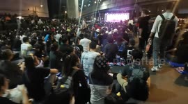 Hundreds of pro-democracy protesters rally in Thai capital against court ruling