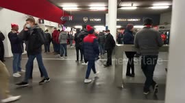 Supporters queue for refreshments in Arsenal's ground as stadium reopens for 2,000 fans
