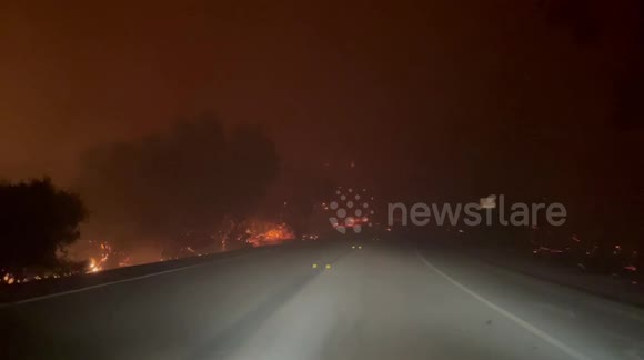 Harrowing video shows California man desperately fleeing Bond fire through only available escape road