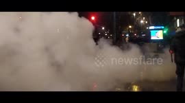 French police clash with protesters over security law