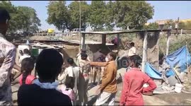 This video is from Gujarat.  There is a video of the demolition of people's homes by making tax on government land