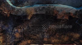 Aerial view of a pool, swimming pool and spa in deterioration due to being abandoned and burned, located in the rural area of Real del Alamito in Sonora, Mexico