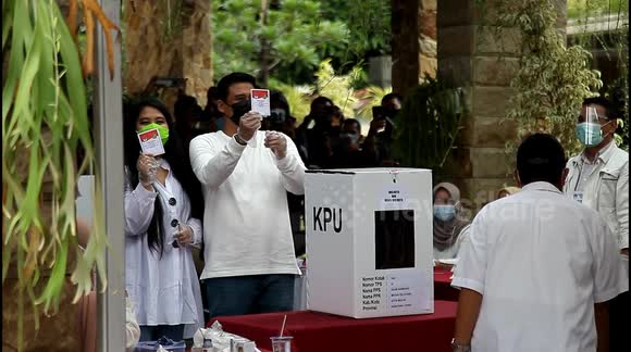 Indonesia local election: President's son-in-law casts vote amid COVID surge