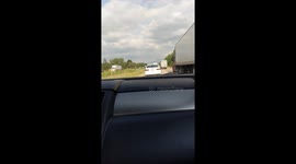 Darkened Light driving freeway man music daylight morning