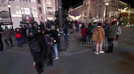 Picadilly Circus Attracts The London Crowds s