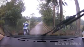 Motorcycle Rider Survives Head-On Crash With Car