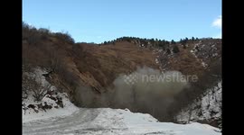 Mountain road is dynamited to make room for expansion