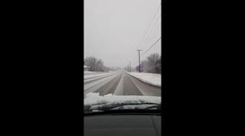 Watch as heavy snow falls in Norman, Oklahoma, just 48 hours after the temperature hit 75 degrees