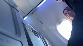 Passengers are filmed not wearing masks on an American Airlines flight