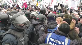 Dozens of police injured after clashes break out during protest over COVID restrictions in Ukraine