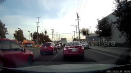 Man bringing out boxes for shipment drops them all