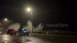 Big waves hit Cornwall slamming into the road