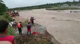 Rescuers Use Zip-Line Over Flooded River To Save Families The Philippines