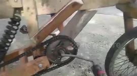 Skilful Filipino man who could not afford a bicycle built his own from junk